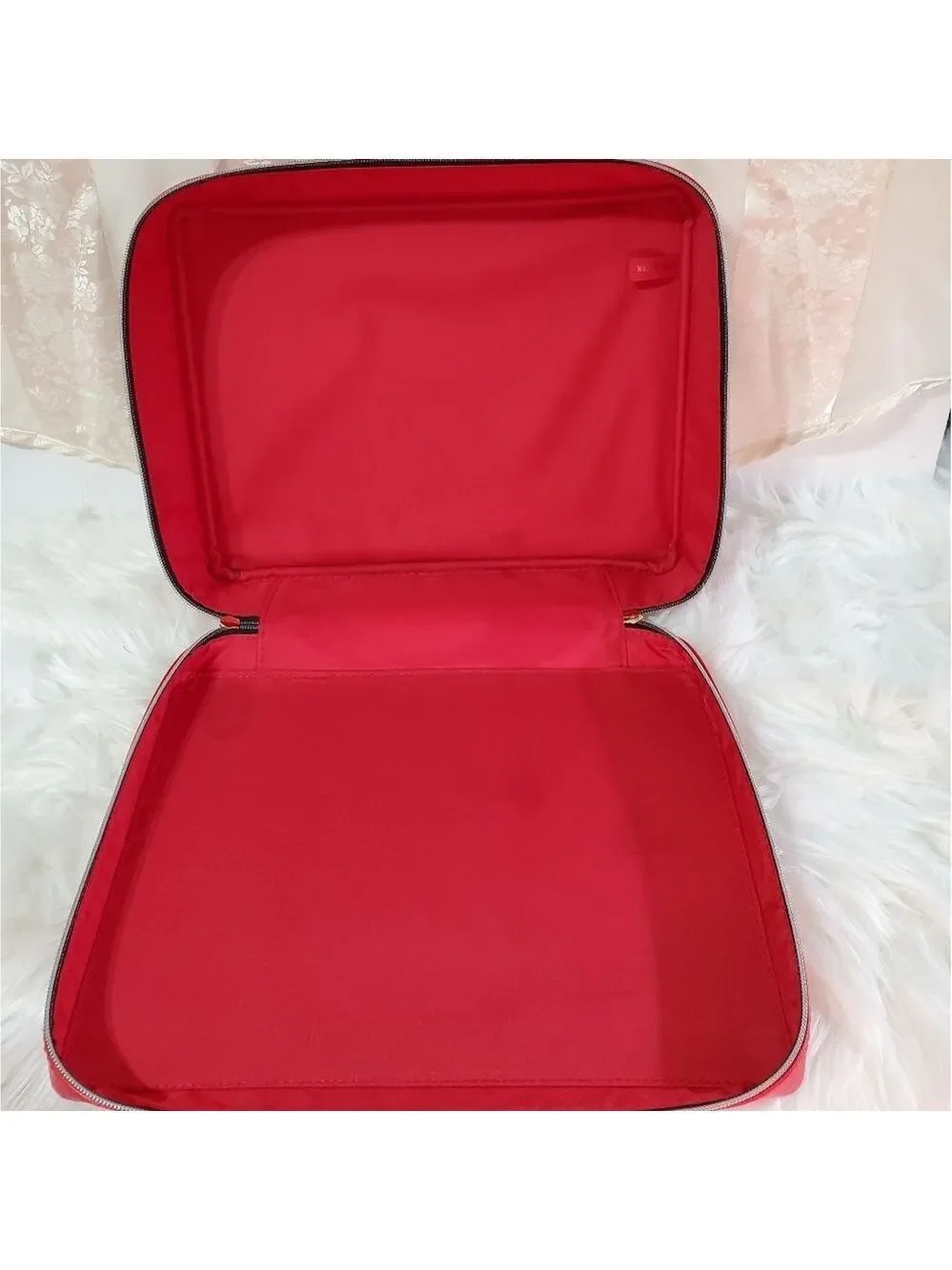 Estee Lauder very roomy